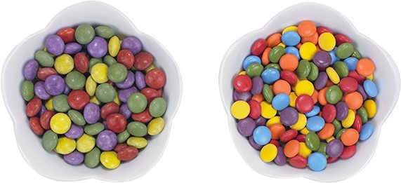 Two adjacent cereal bowls filled with coloful cereal.