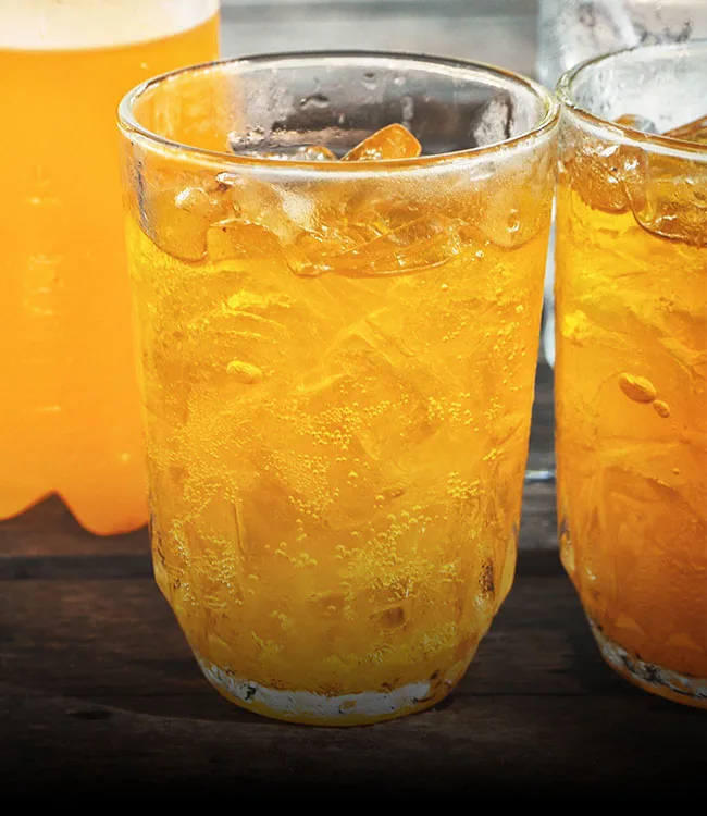 fruity orange soda drink