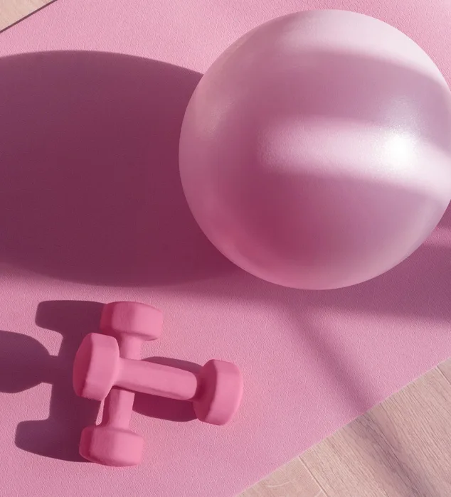 pink weights, yoga mat and yoga ball